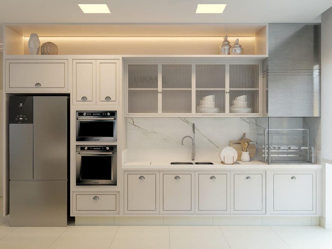 Cozinha clássica com ilha esculpida e bancada branca