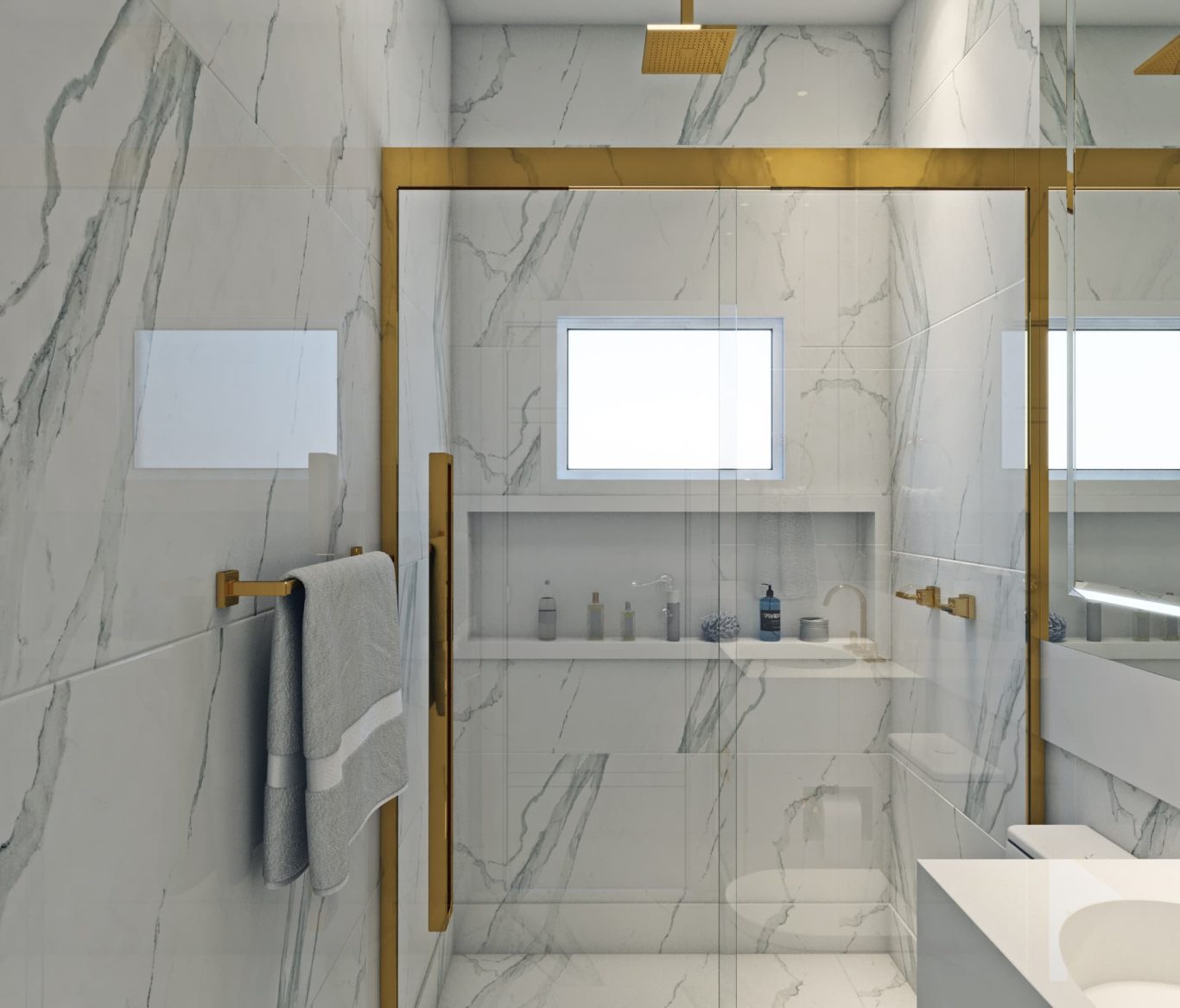 Banheiro com Mármore Branco e Detalhes Dourados